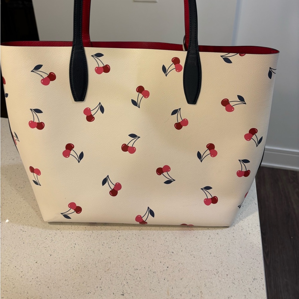 Kate Spade leather tote bag with cherries